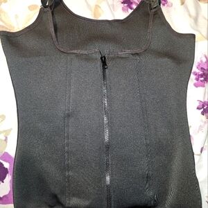 Black shapewear with sholder straps.